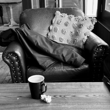 Find photograph of leather armchair in a coffee shop for sale.