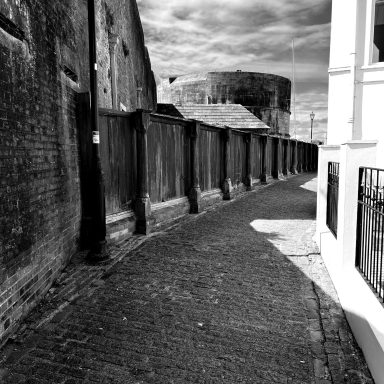 Cobbled alleyway Find a black and white photograph of a cobbled alleyway in Old Portsmouth.