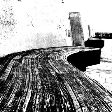Find a photograph of wooden benches for sale